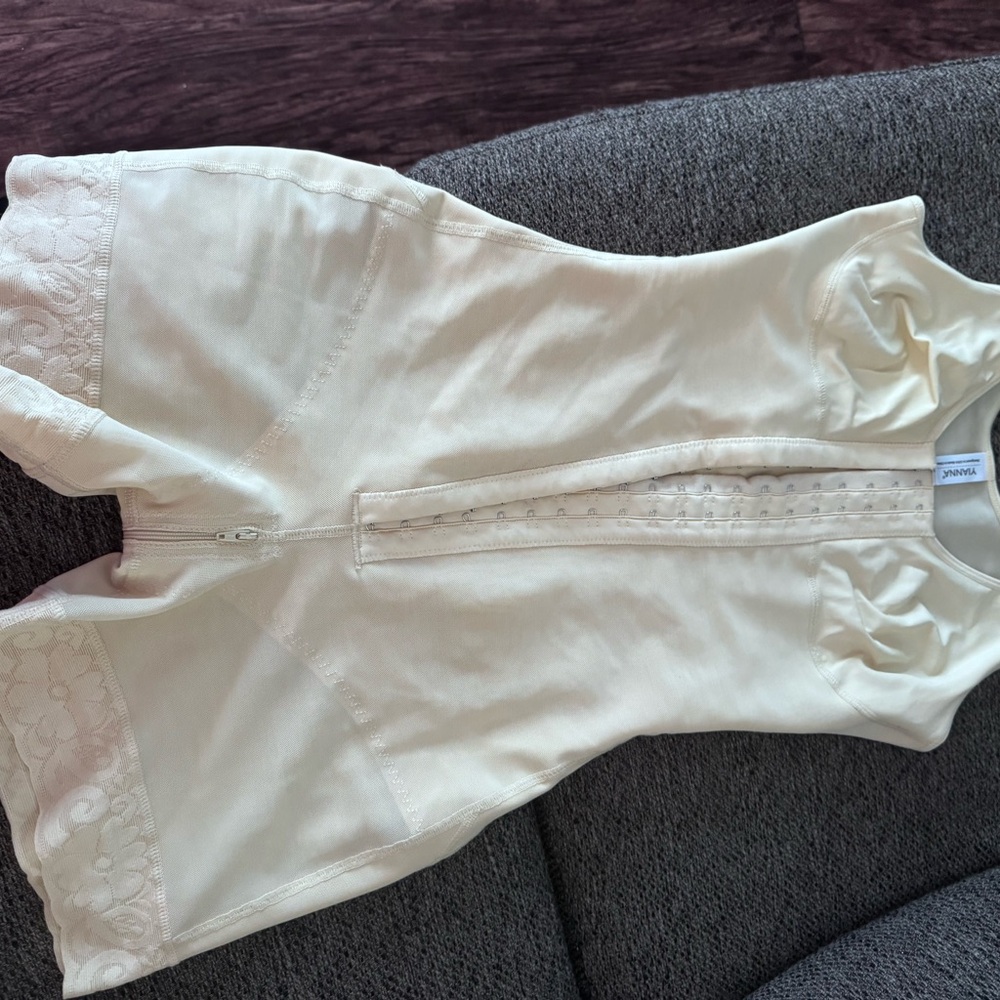 Cream Lace-Trimmed Bodysuit
